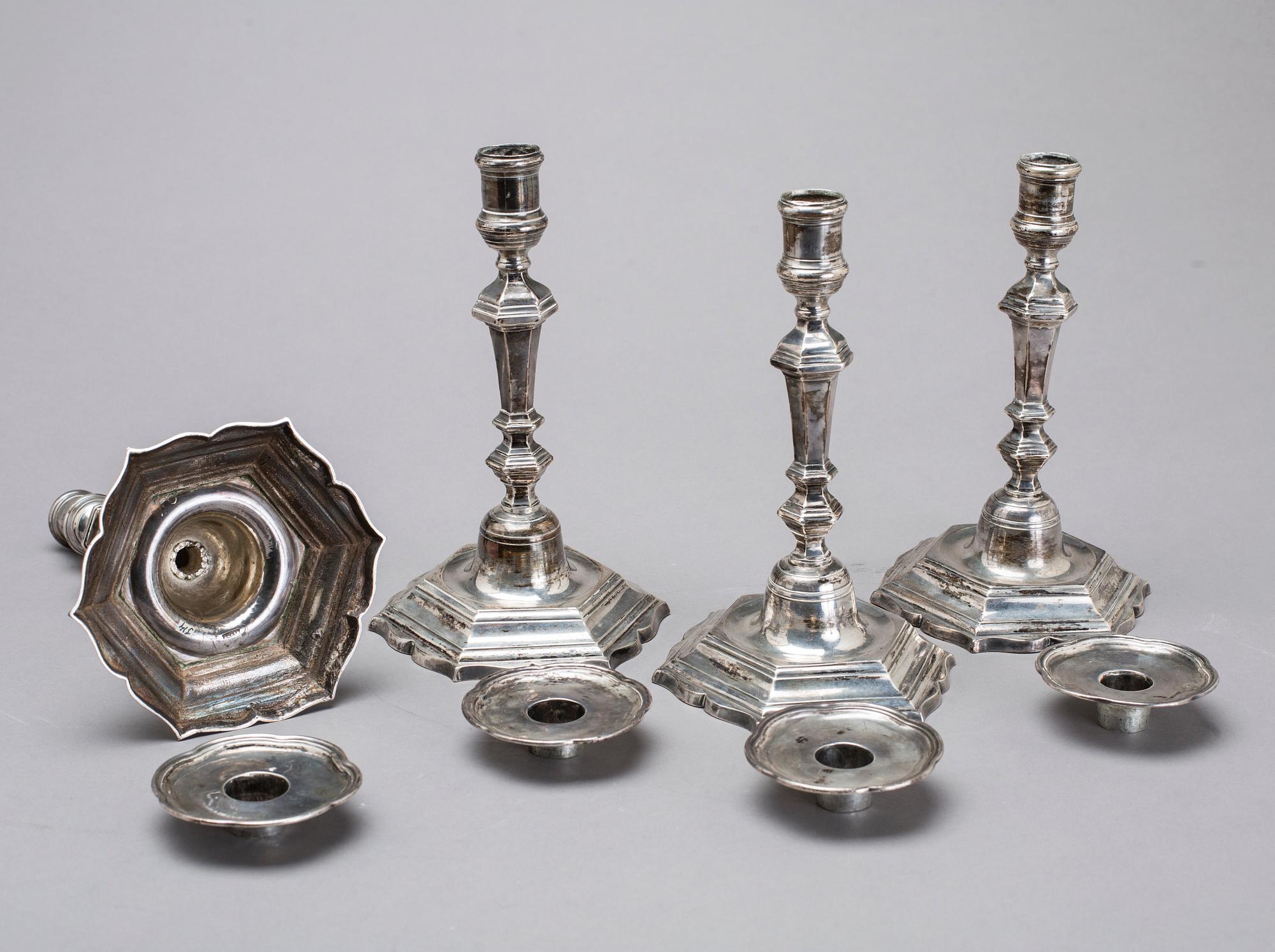 Two simular pairs of candlesticks, two marked Barde, Geneve 18th century, two with later marks.