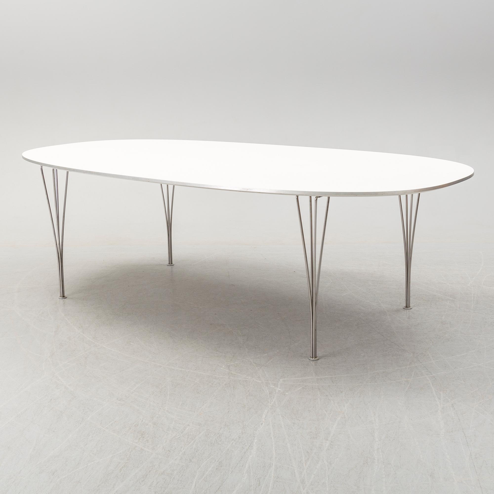 A 'Superelips' table by Bruno Matsson and Piet Hein, Fritz Hansen, Denmark.
