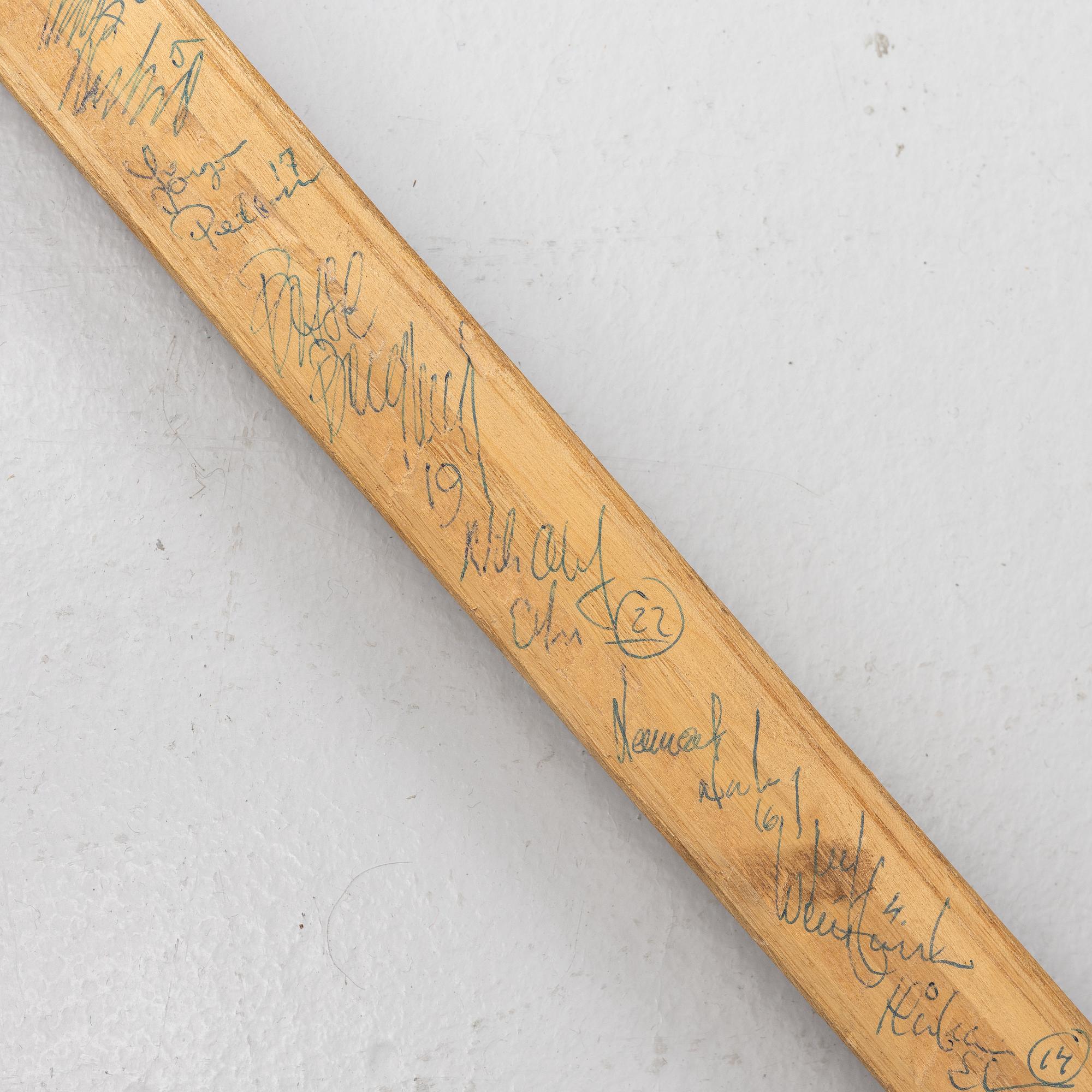 Pelle Lindberg's goaltender stick with autographs.