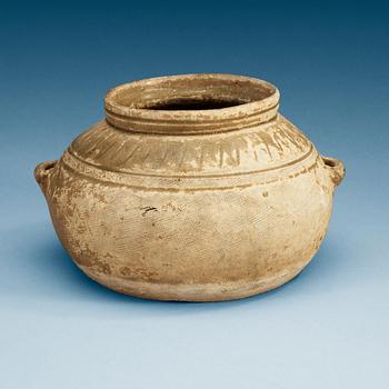 1409. A olive green glazed jar, Western Jin Dynasty, ca 300 AD.