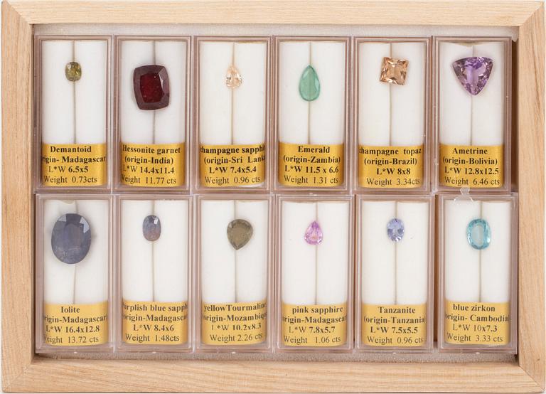 A collection of twelve gemstones.