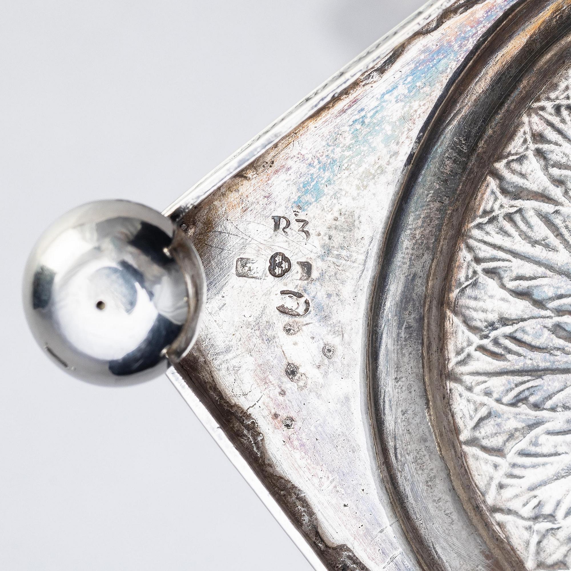 A pair of Gustavian silver candlesticks, unclear maker's mark, the cuffs with mark of Pehr Zethelius, Stockholm 1796.