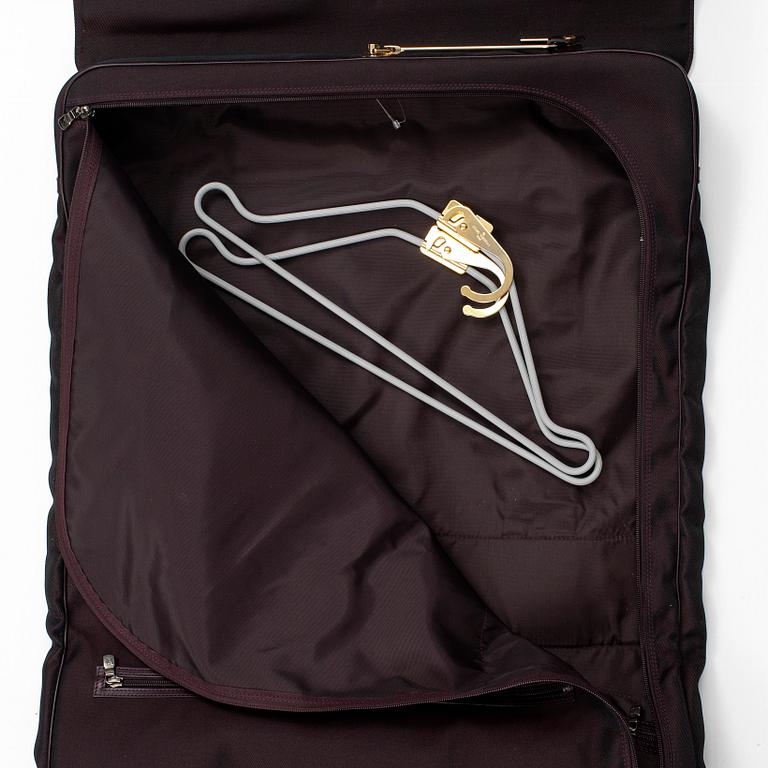 LOUIS VUITTON, a 'Gibeciere' garment cover.