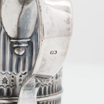 A sterling silver jug, London, unidentified marks.