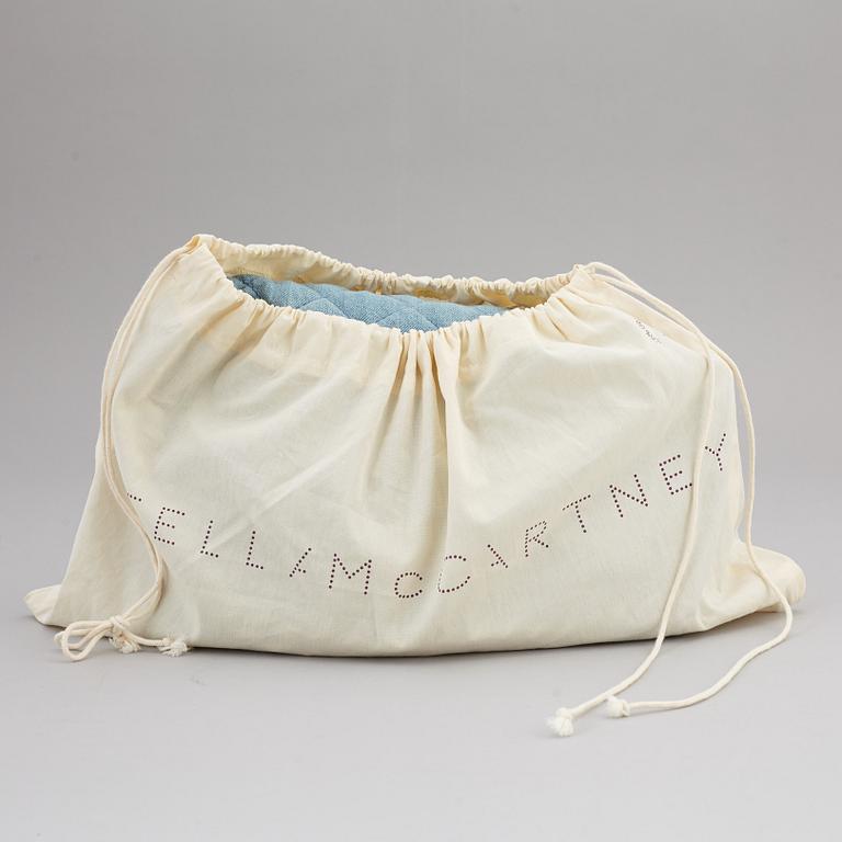 STELLA MCCARTNEY, a denim handbag.