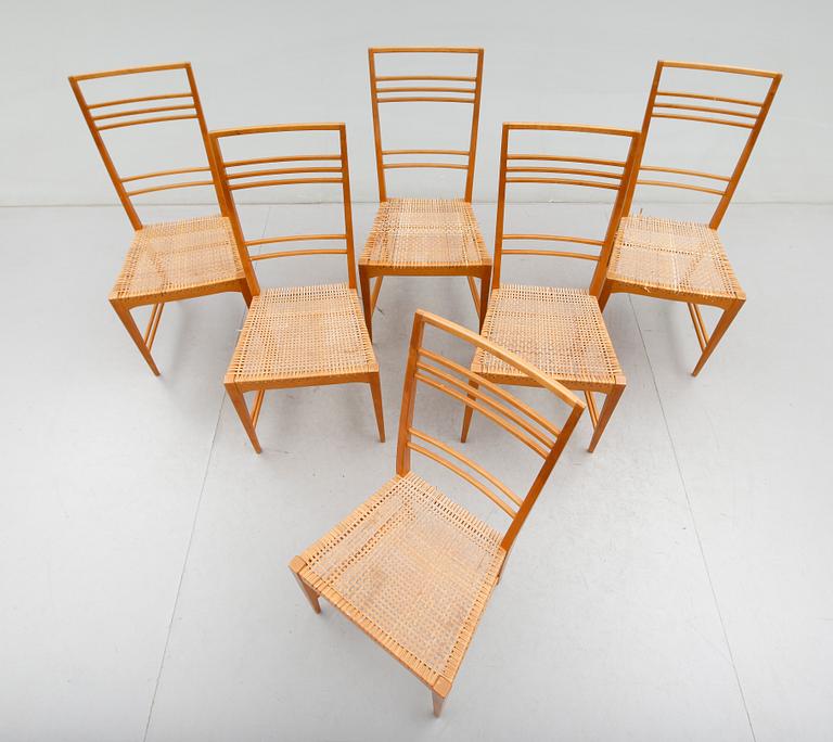 A set of six Erik Chambert 'Poem' birch and rattan dining chairs, Chambert's, Norrköping, Sweden, probably 1950's.
