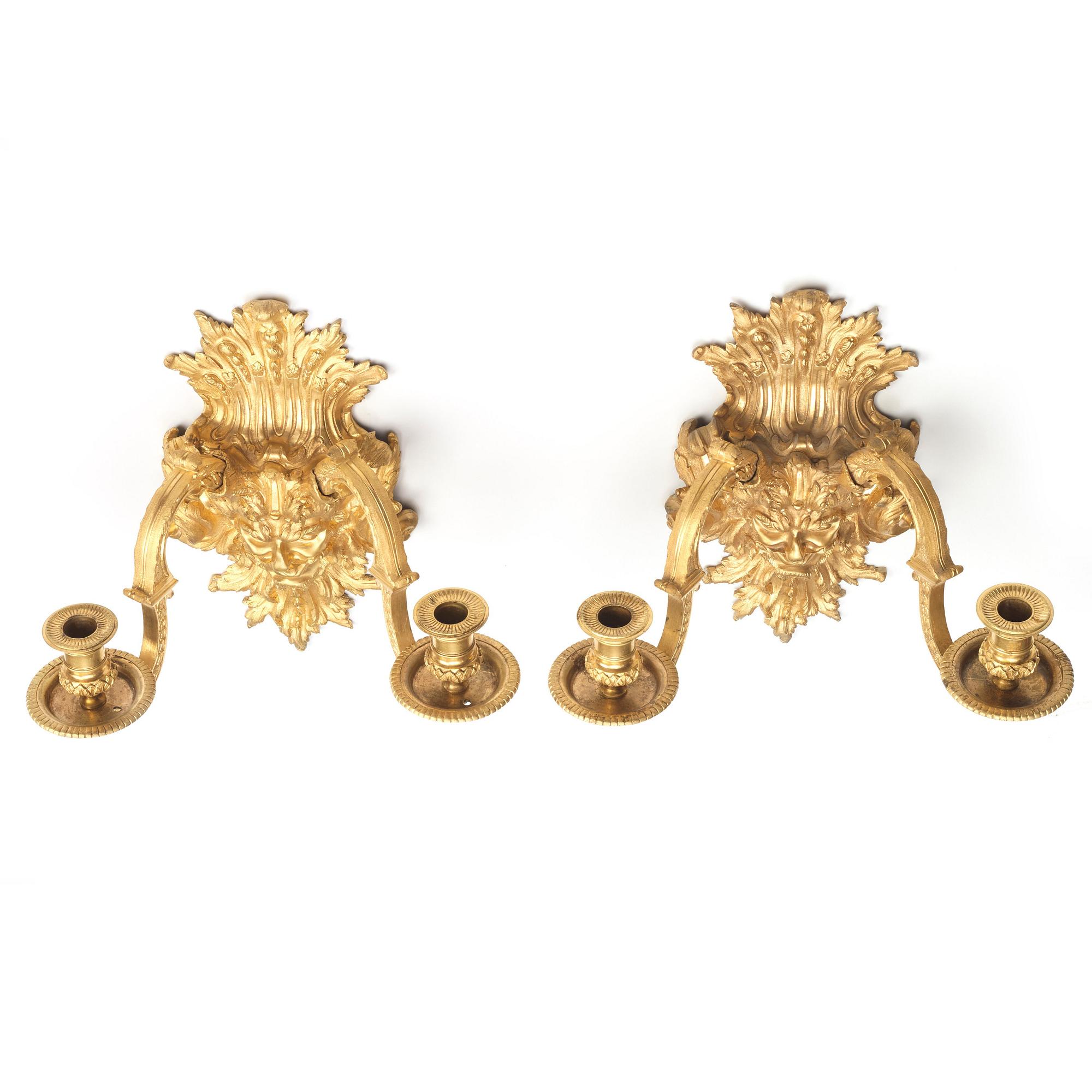 A pair of Baroque-style mid 19th century two-light wall-lights.