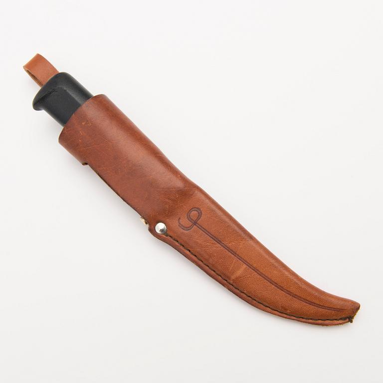 A 1970s Finnish puukko knife in stainless steel, nylon and brass designed by Tapio Wirkkala, Lapin Puukko.