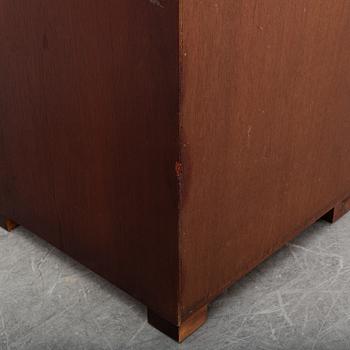 A pair of mahogany bedside tables, England second half of the 20th century.