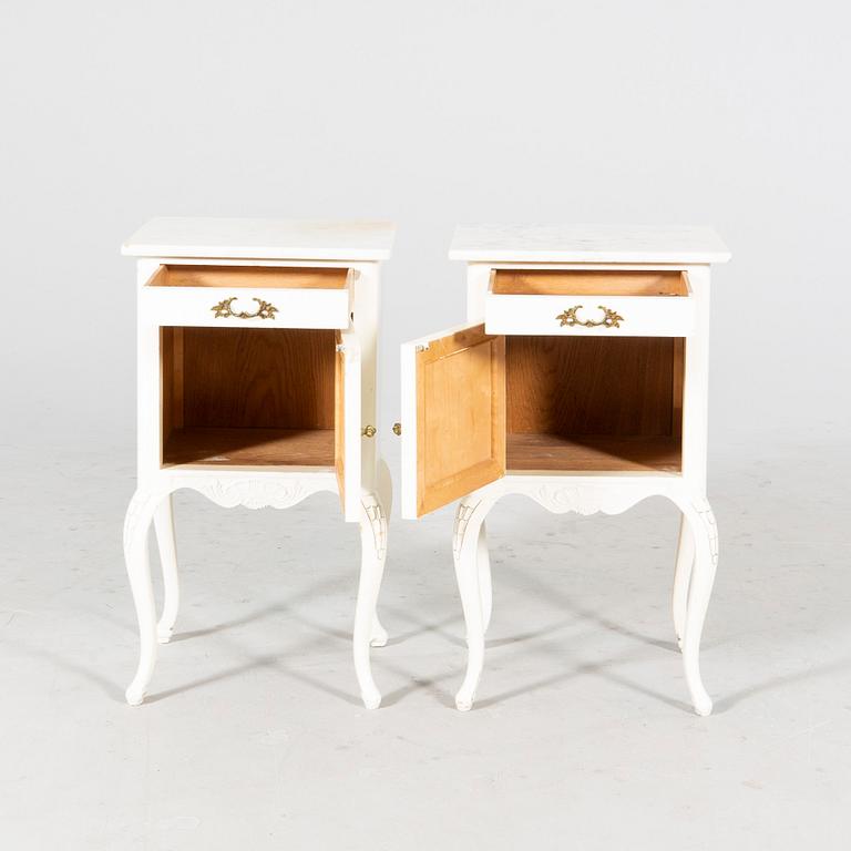 A pair of painted Rococo style bedside tables mid 1900s.
