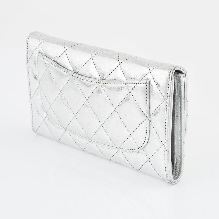 Chanel, a quilted silver leather wallet, 2006-08.