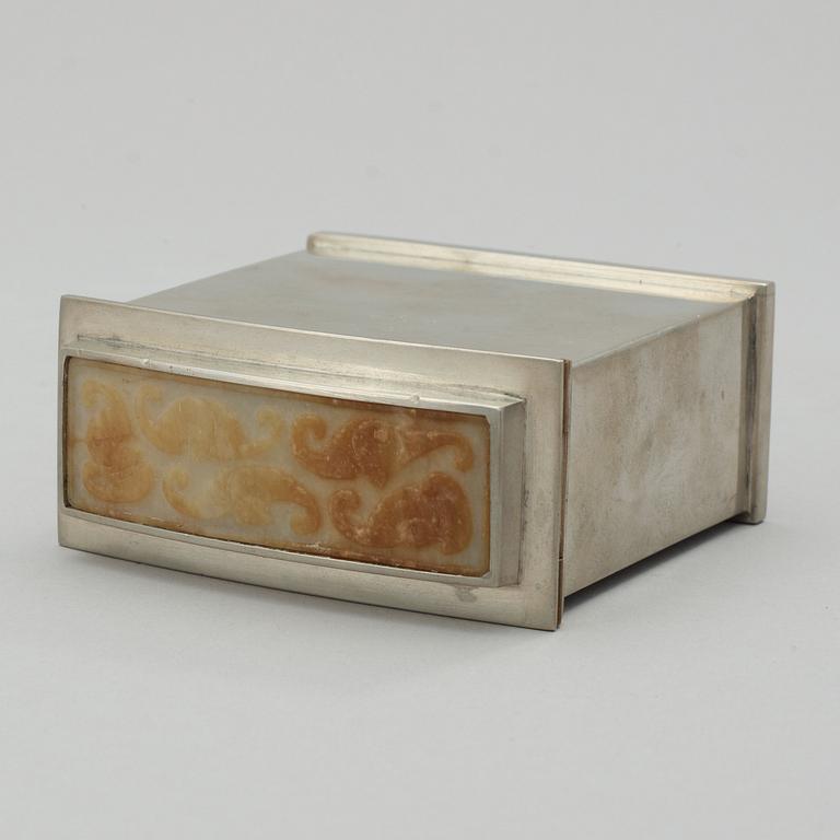 A pewter box attributed to Estrid Ericson, Svenskt Tenn, Stockholm 1949, the lid with a stone, probably a nephrite.