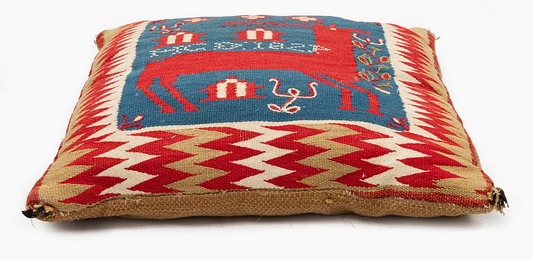 A double-interlocked tapestry cushion, c. 46 x 44 cm, probably Skytts district, signed and dated HGD 1824.
