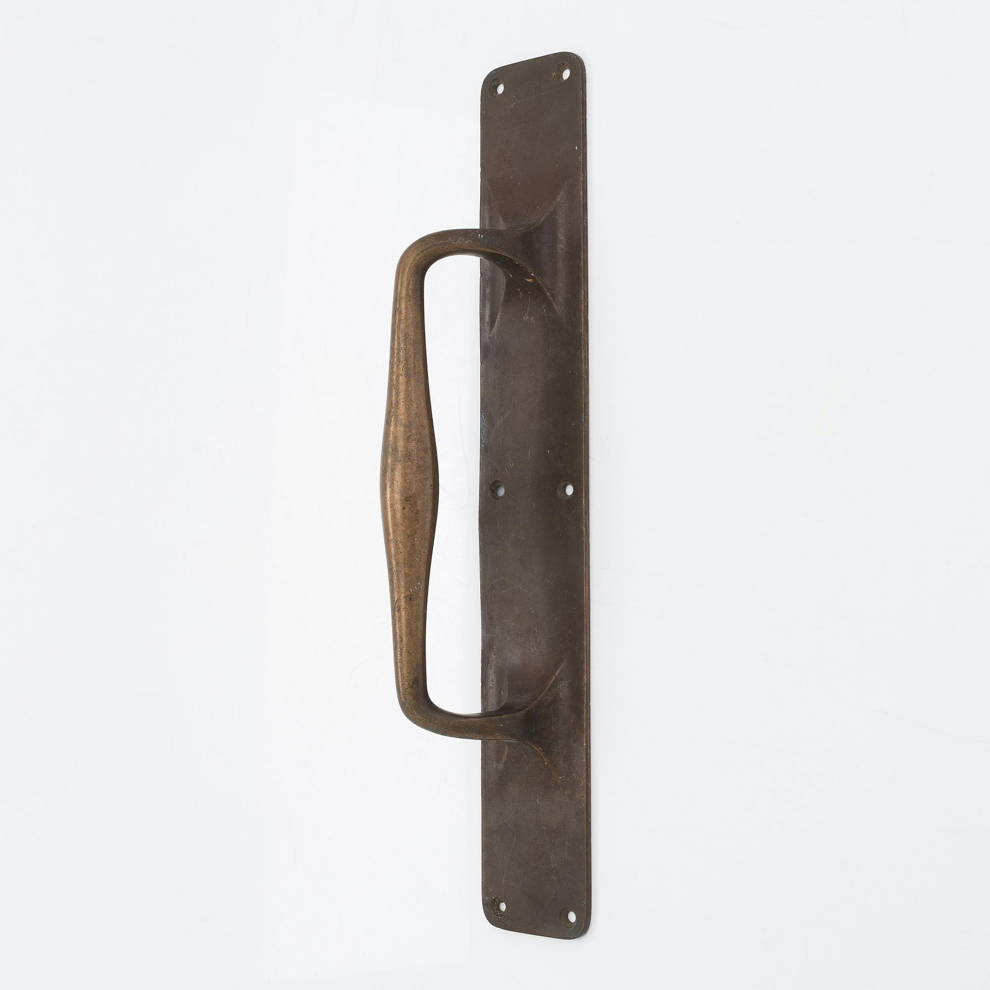 An Art Nouveau door handle from early 20th century.
