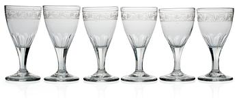 383. A set of six early 19th cent wine glass.