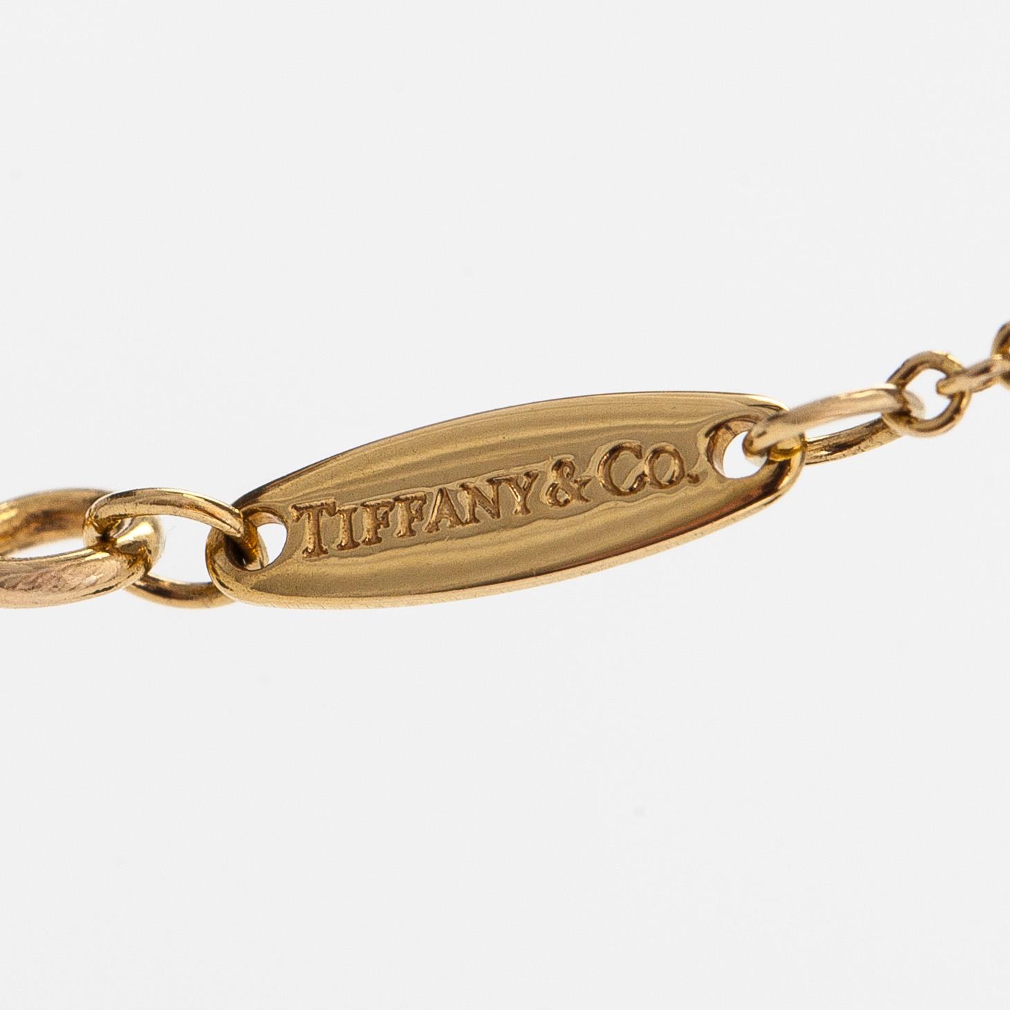 Tiffany & Co, Elsa Peretti, an 18K gold 'Diamonds by the Yard' necklace with a brilliant-cut diamond.