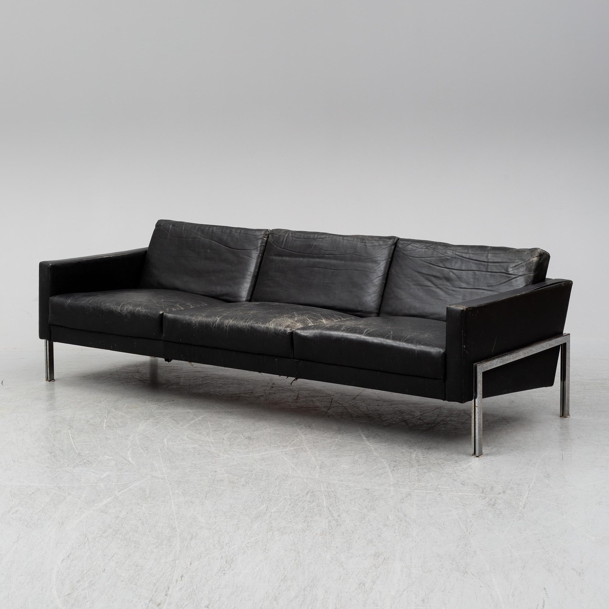 A 1960's leather covered sofa.