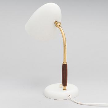 A mid-20th century tablelamp for Stockmann Orno, Finland.