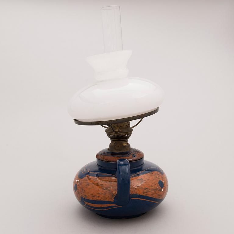 Alfred William Finch, A Finnish oil lamp around 1900 by Iris.