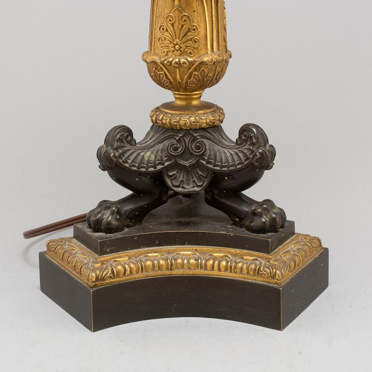 A first half of the 19th century bronze table lamp.