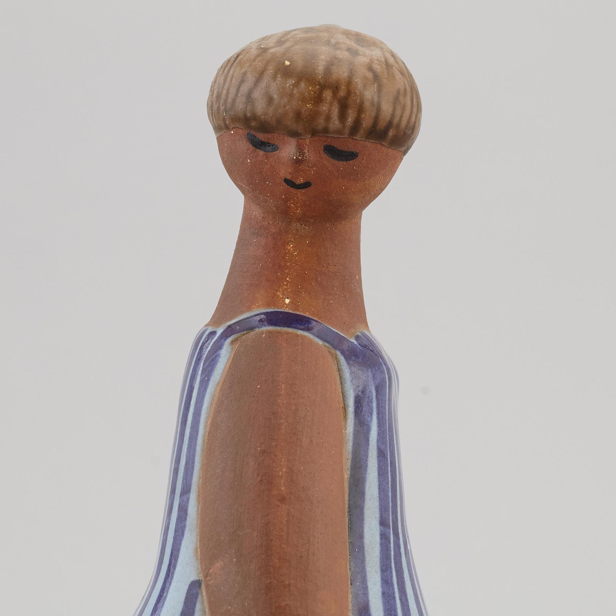 LISA LARSON, a 'Dora' stoneware figurine, from ABC-Flickorna, Gustavsberg.