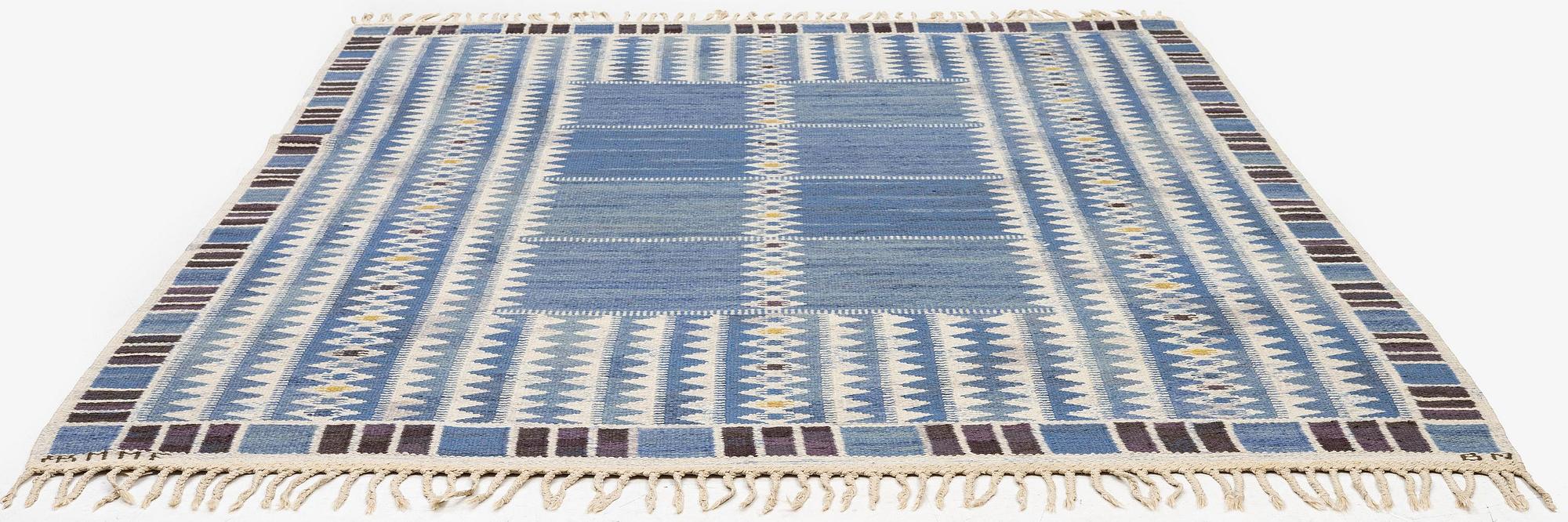 Barbro Nilsson, a carpet, 'Salerno blå', flat weave, c. 245 x 182 cm, signed AB MMF BN.