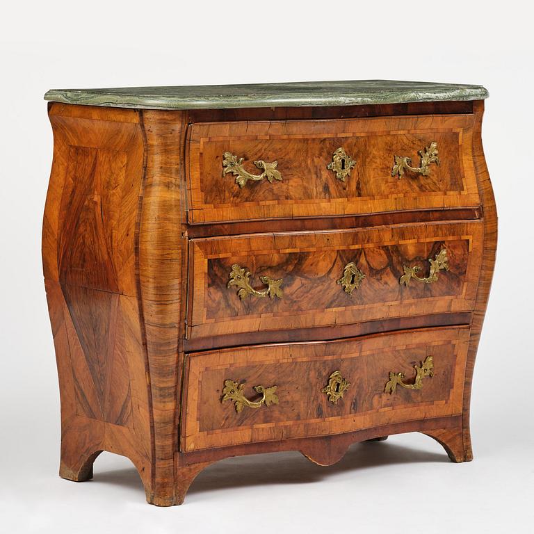 A Swedish rococo parquetry commode by C. Linning (master in Stockholm 1744-79).