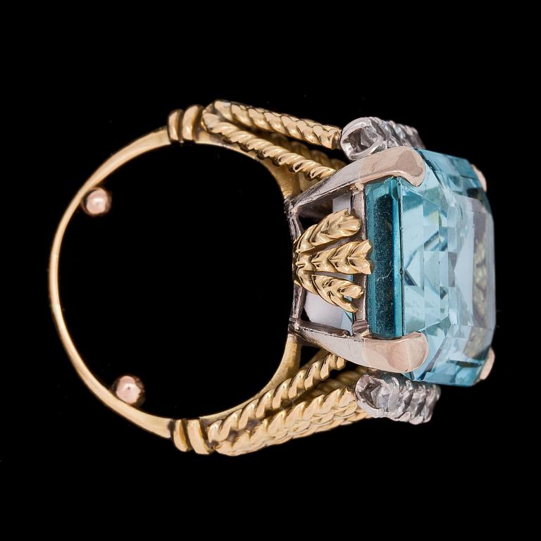 A step cut aquamarine and brilliant cut diamond ring, tot. app. 0.70 cts.