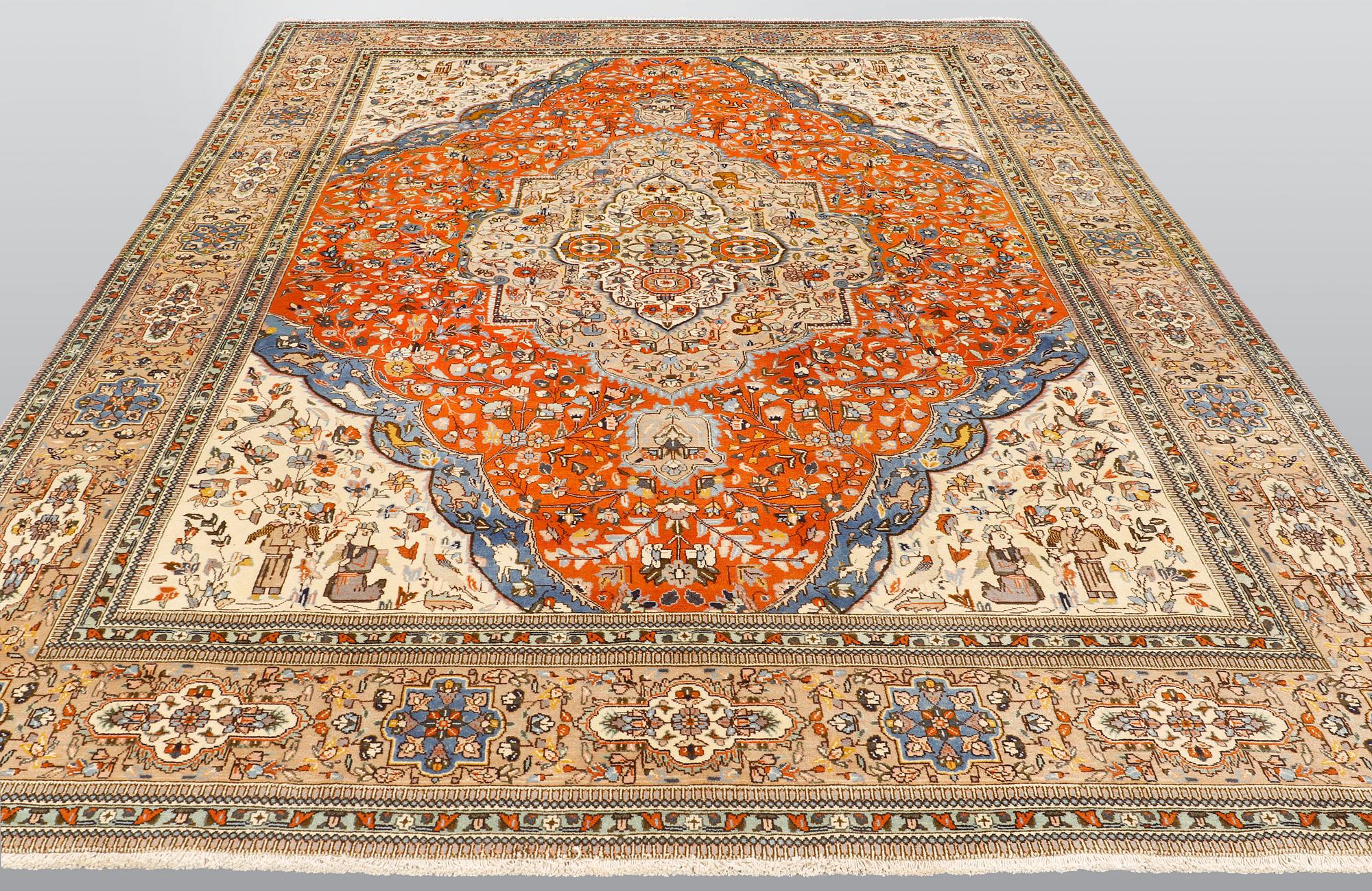 A carpet, Figural Tabriz so called Tabatabai, ca 390 x 268 cm.