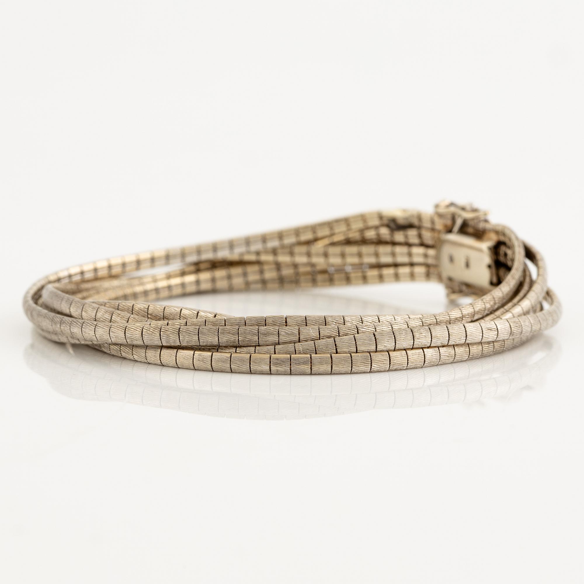 Bracelet 18K white gold.