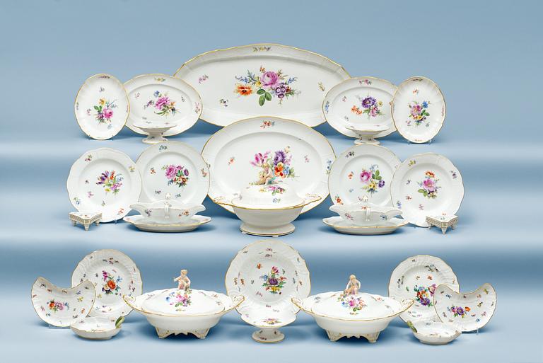 An extensive Meissen dinner service, circa 1900. (90 pieces).