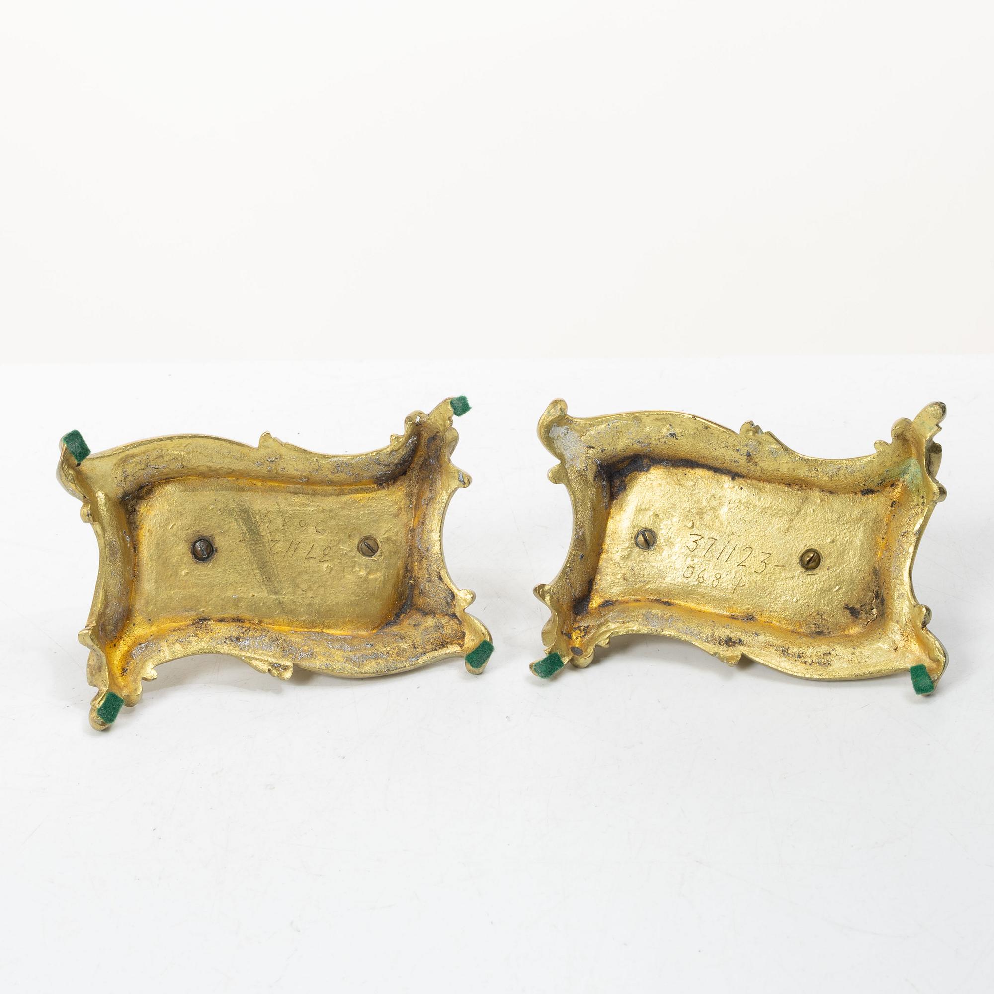 Table ornaments in the form of shoes, a pair, fire-gilt bronze, probably France, 19th century.