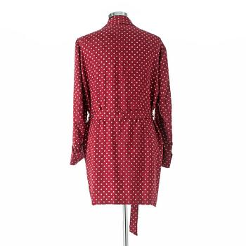 EDSOR KRONEN, a burgundy red and white polka dotted dressing gown.