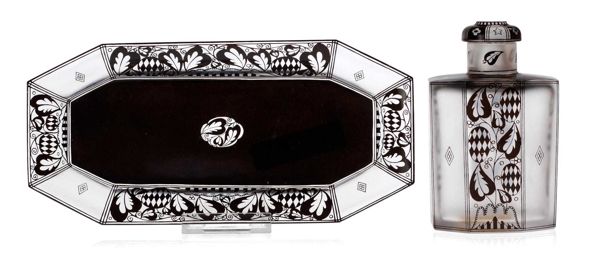 A Josef Hoffmann glass bottle and dish, from a five-piece toilet garniture, 'Achteckig Schwarzbronzit', Vienna 1910's.