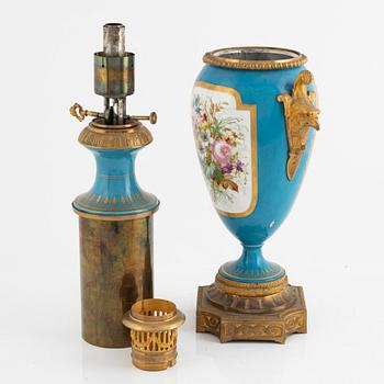 A gilt-brass and porcelaine Louis XVI-style kerosene lamp, later part 19th century.