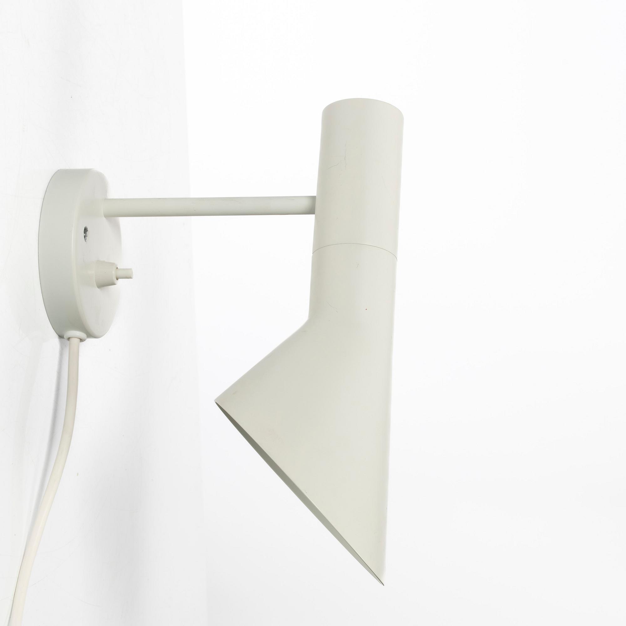 Arne Jacobsen, An 'AJ' wall lamp. Louis Poulsen, 21st century.