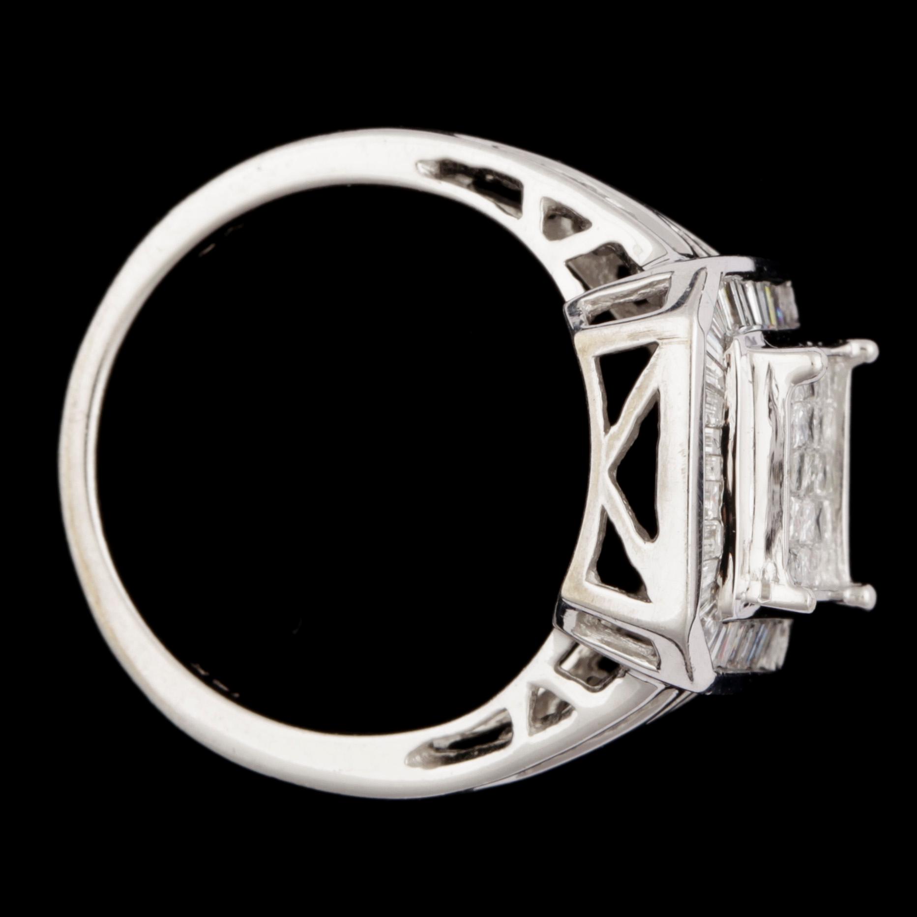 RING, 14k vitguld med princess- och baguetteslipade diamanter tot ca1,50ct. Vikt 5,3g.