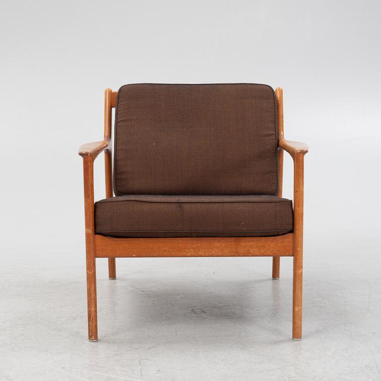 Folke Ohlsson, an 'USA 75' armchair, Dux, Sweden, 1960's.
