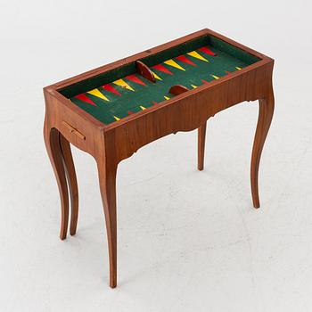 A Rococo game table, 18th century.