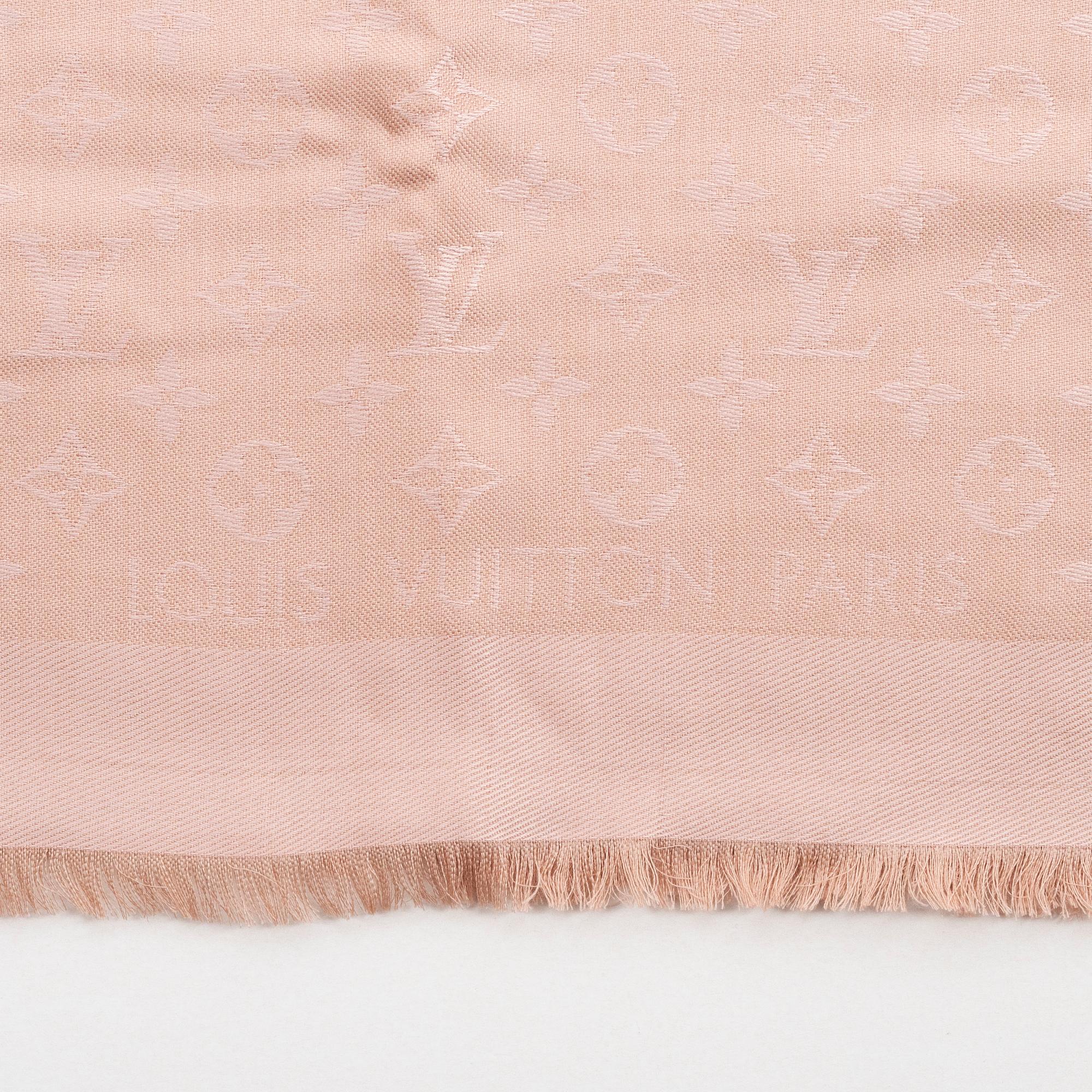 Louis Vuitton, a monogram silk and wool mix shawl.