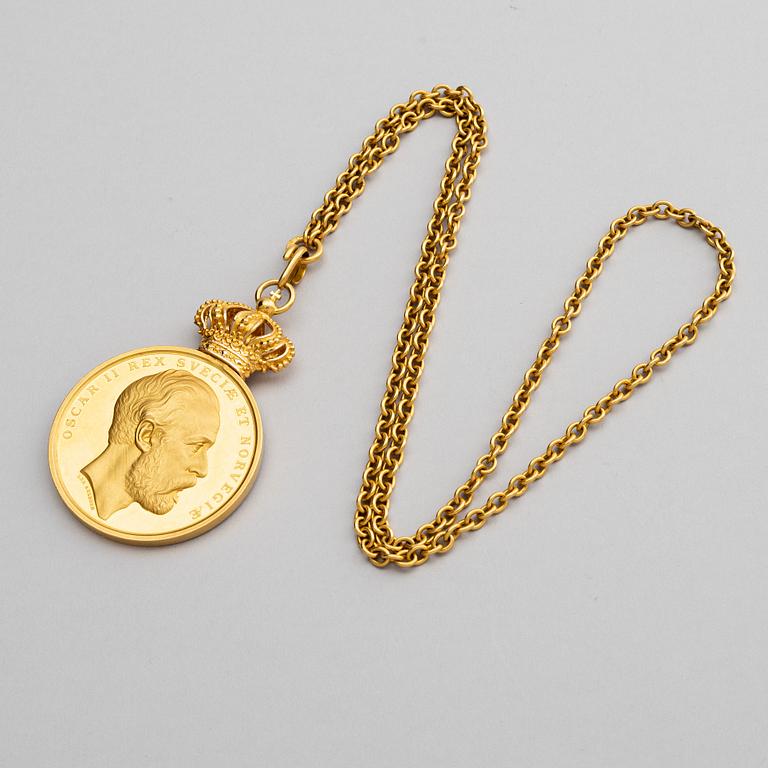 The Royal Illis Quorum medal in gold with chain awarded to Ludvig Berckhan Falkman.
