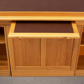 An oak writing desk by Finn N Hansen. End of the 20th Century.