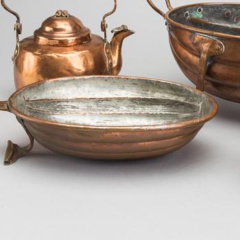 Six 19th century copper pots and pans.