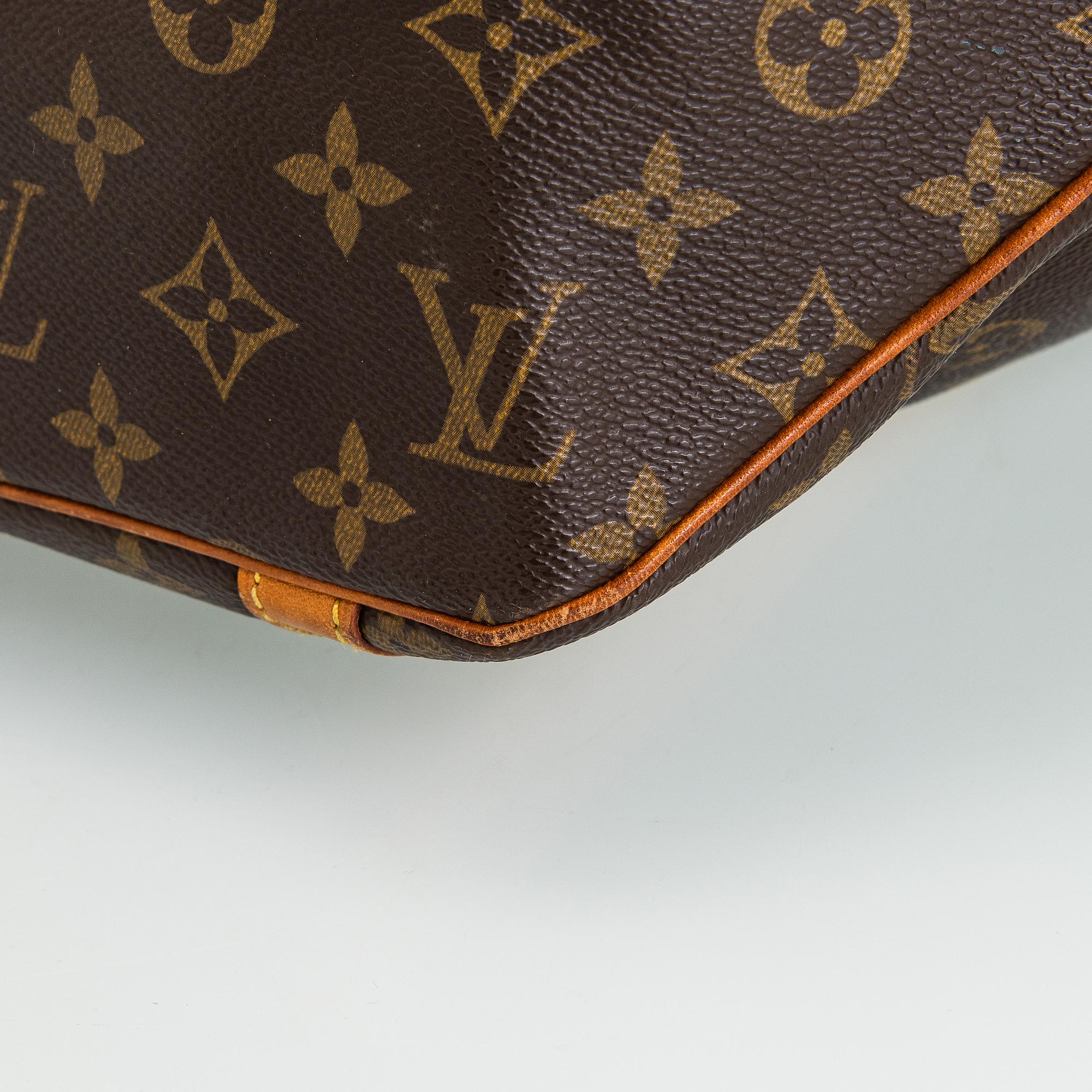 Louis Vuitton, a Monogram Canvas 'Sac Shopping' bag.