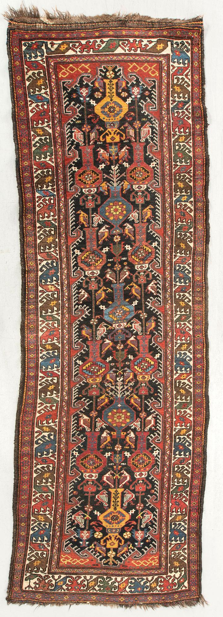 A semiantique/antique Bachtiari runner ca 322 x 106 cm.