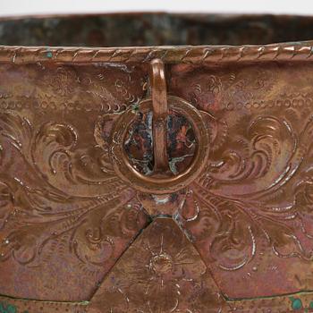 A Swedish baroque repousse copper cauldron, early 18th century.