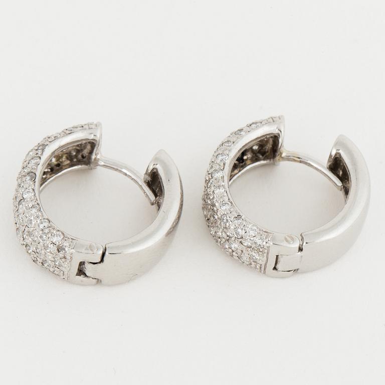 Platinum and brilliant-cut diamond earrings.