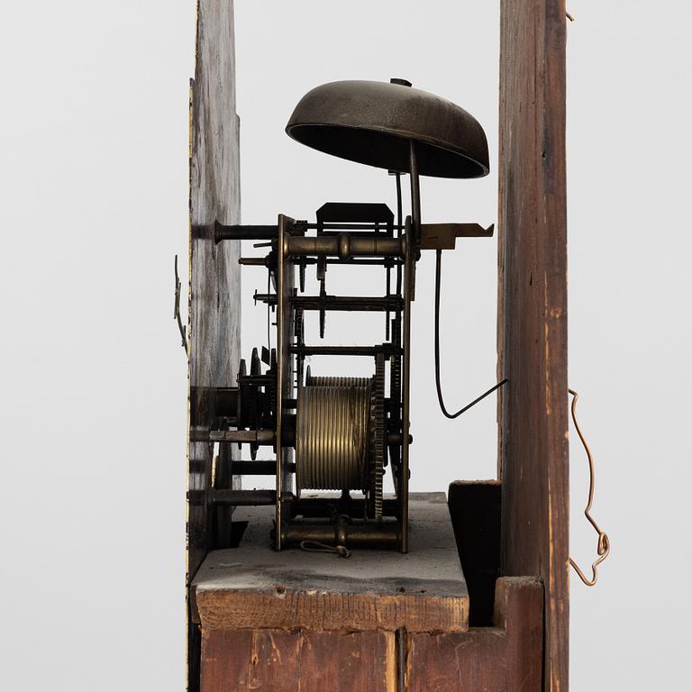 A mahognay long case clock from around the year 1800, H Bunyan Lincoln.