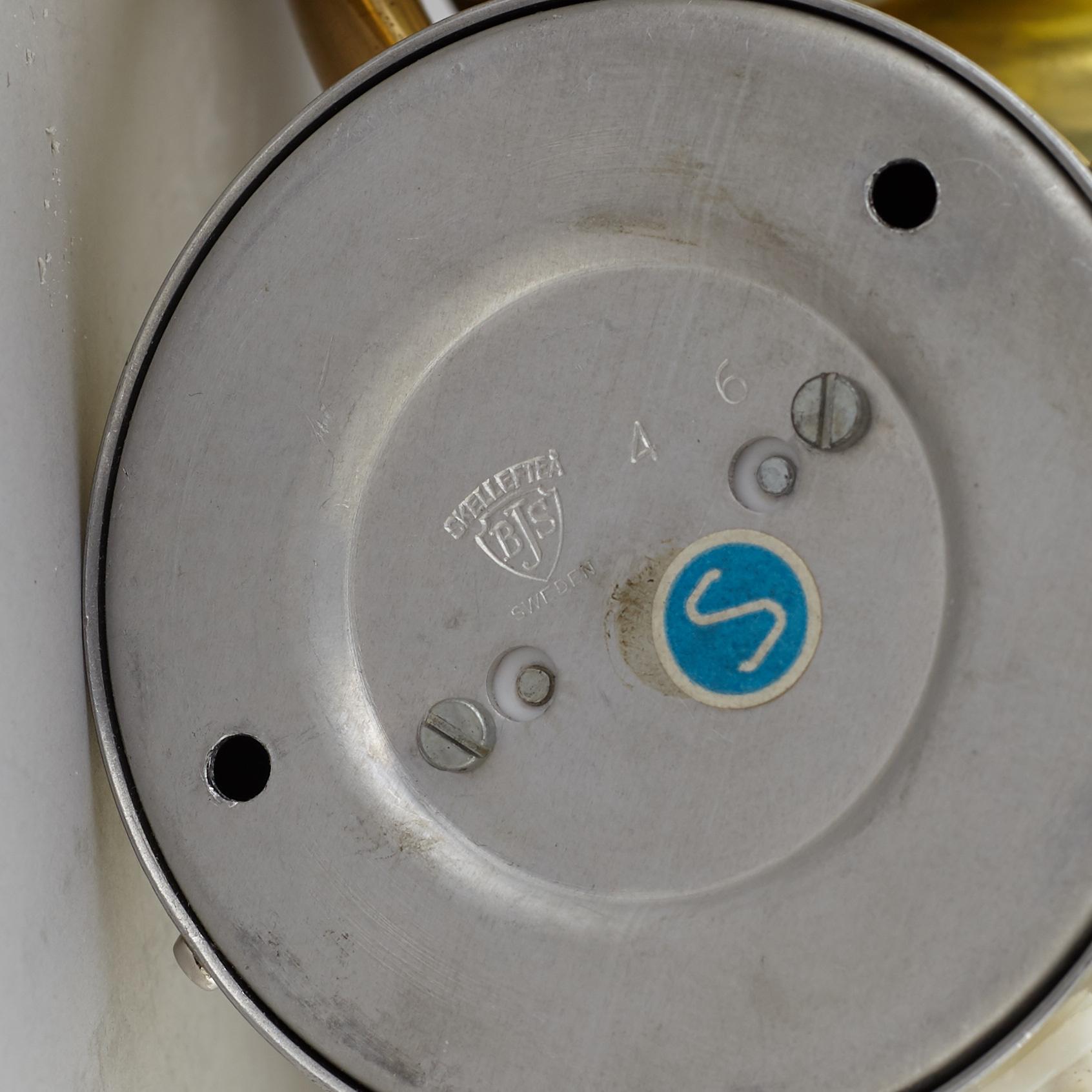 A pair of 1970's wall lamps.