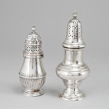 Two silver sugar casters and a silver bowl. Late 19th and 20th century.